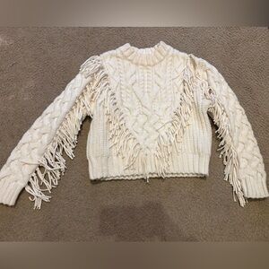 Cream cable knit and fringe sweater